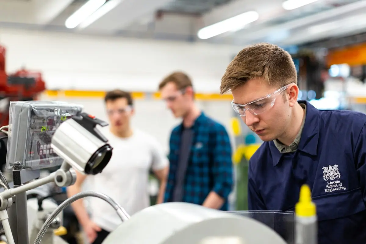 Technicians working in a modern manufacturing plant